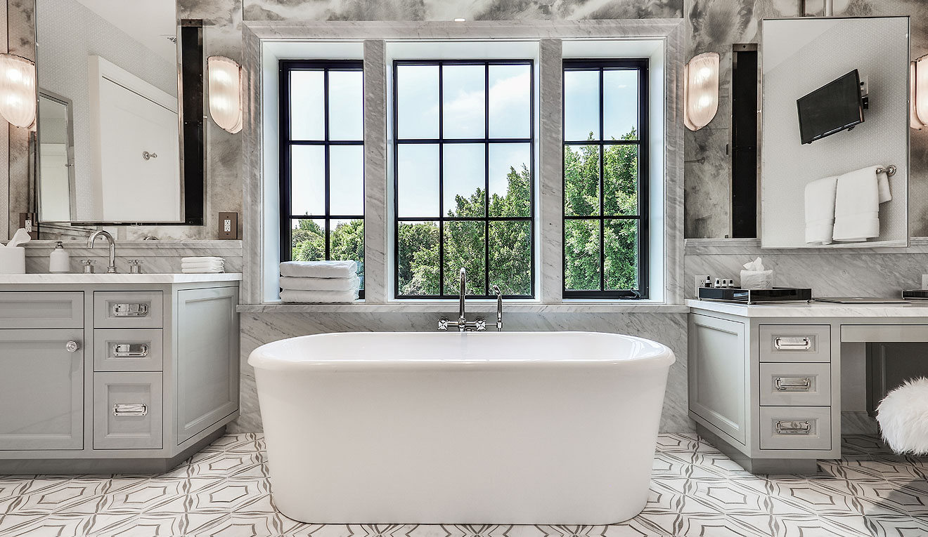 Arcadia T225 thermal aluminum casement windows in a marble primary bathroom with freestanding tub, Ridgedale residence