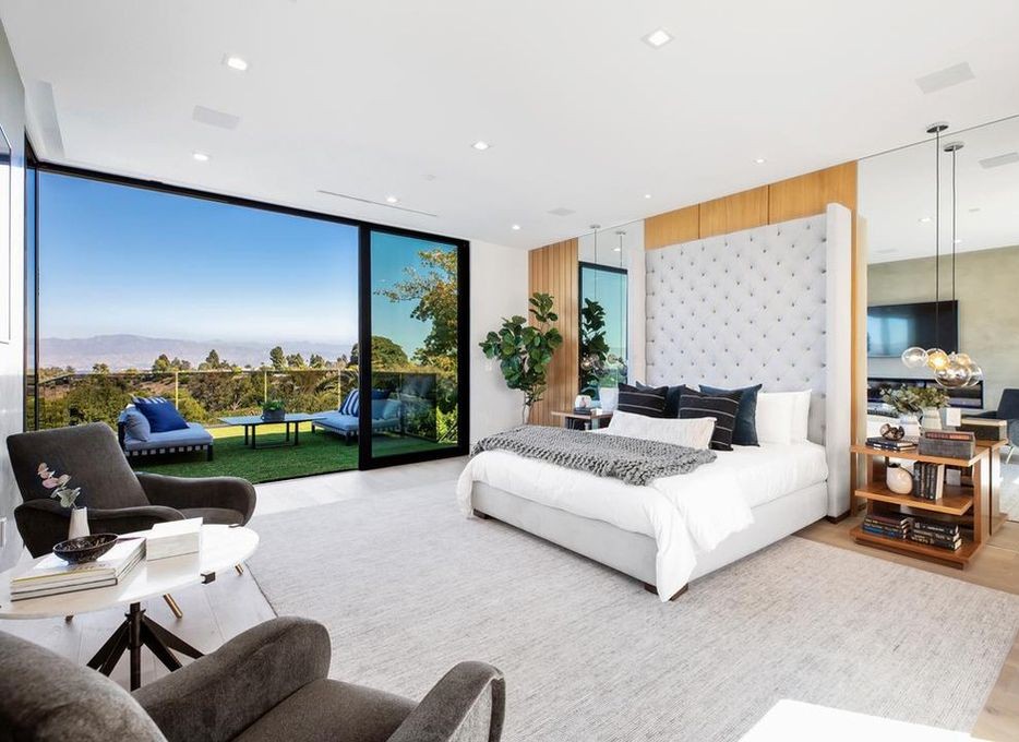 Bedroom in Encino with full-height Arcadia aluminum sliding doors to a terrace and valley view