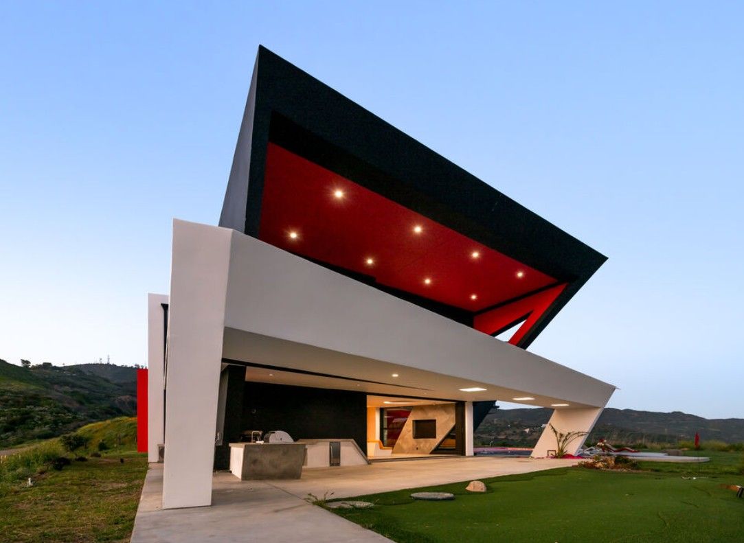 Cantilevered overhang and covered outdoor living area with large sliding glass doors, Topanga Canyon